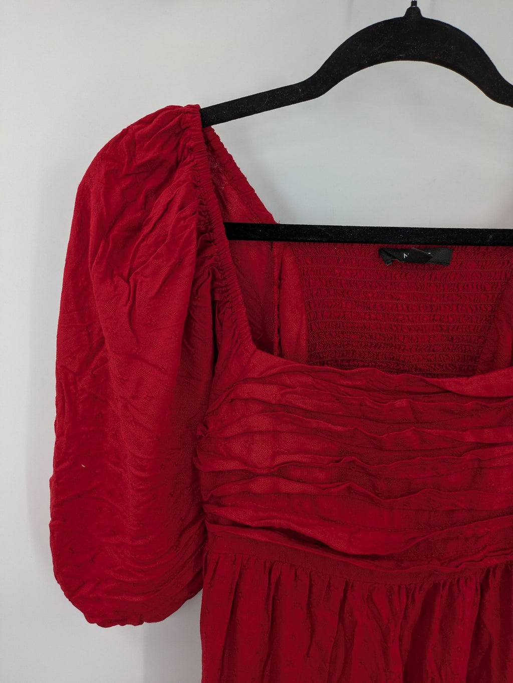NEXT red midi dress with puff sleeves, smocked bodice, and stylish back cut-out.