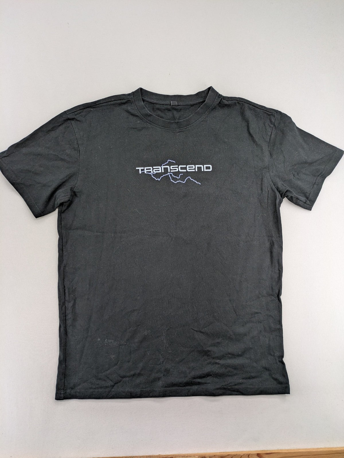 Transcend multi graphic t-shirt black cotton "Go Beyond The Limits" print on back.