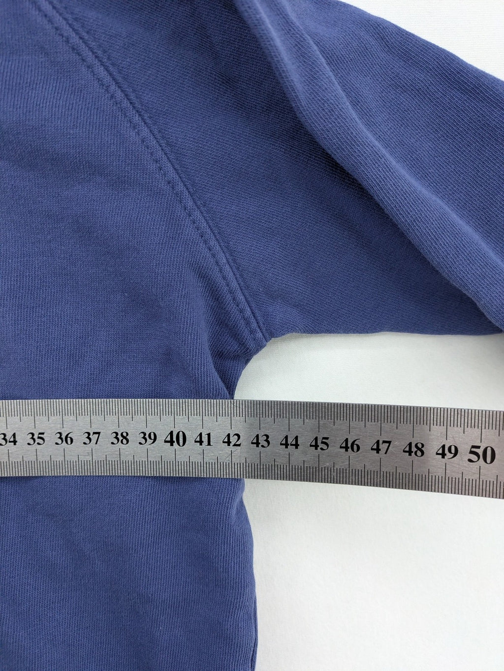 Replay blue turtle neck jumper with large logo print and kangaroo pocket, 100% cotton.