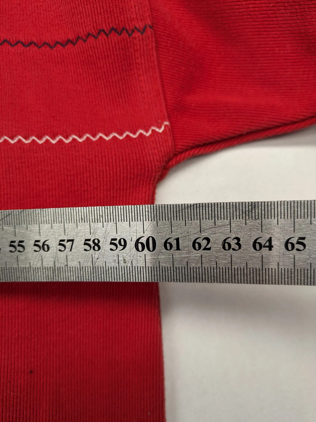 Wind Sportswear red turtle neck jumper with classic polo collar and zigzag stitching.