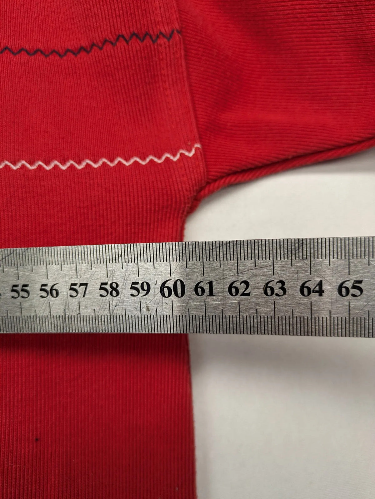 Wind Sportswear red turtle neck jumper with classic polo collar and zigzag stitching.