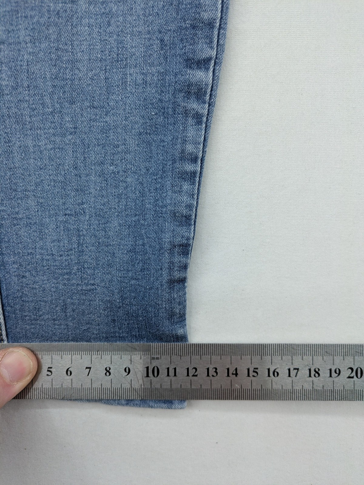 Miss Bonbon blue skinny jeans jeggings with elastic pull-on waistband and light wash.