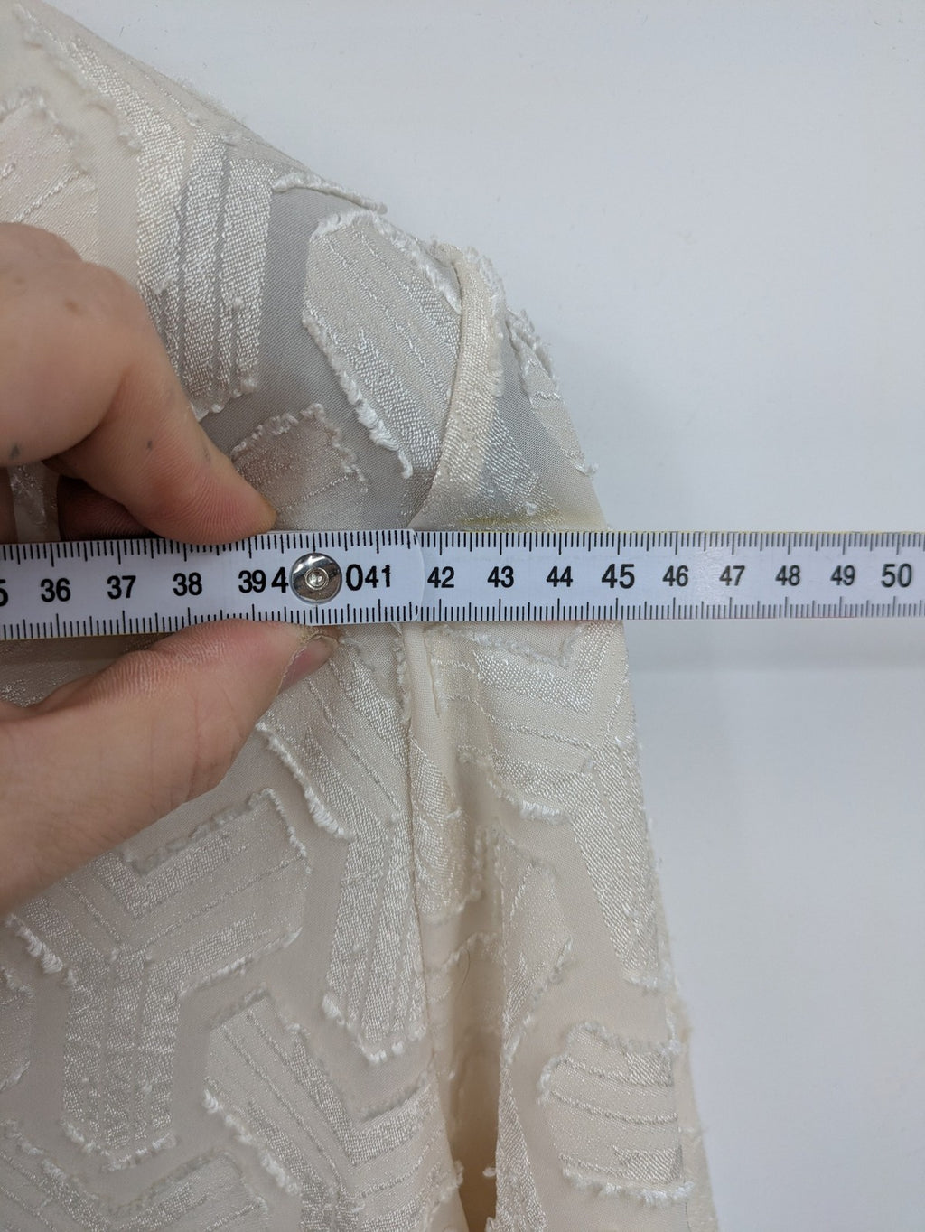 L'ange beige turtle neck jumper geometric pattern lightweight fabric elegant design