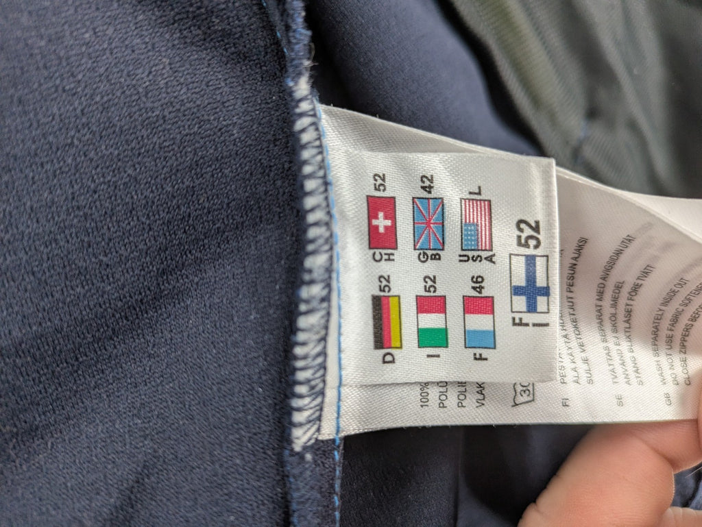 Icepeak blue softshell jacket colorblock design with zip pockets and logo details.