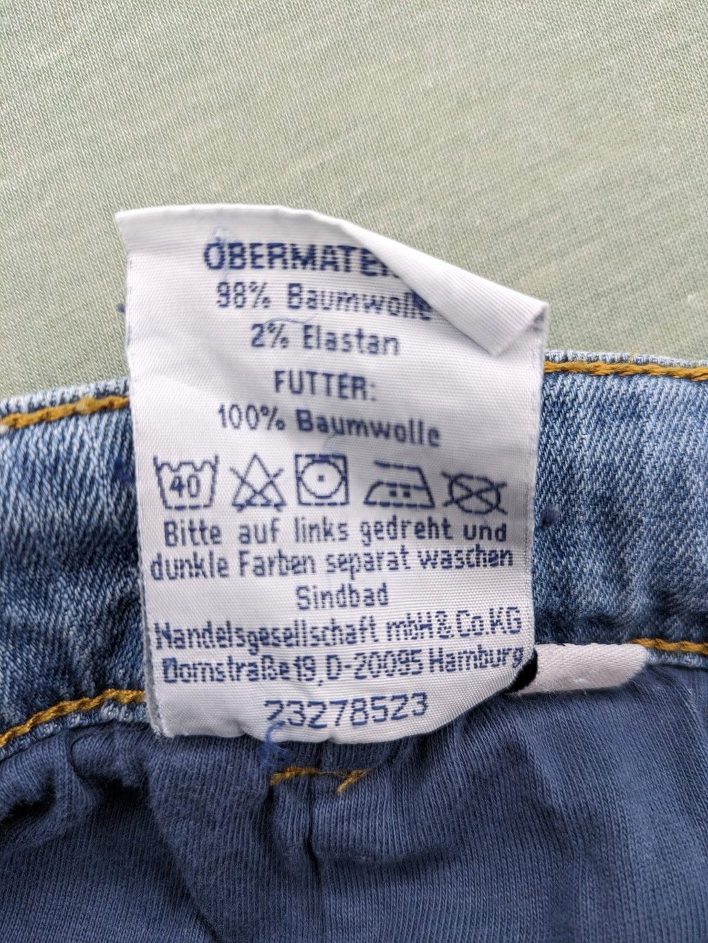 Alive blue straight jeans with classic cut, durable cotton-elastane blend, and button closure.