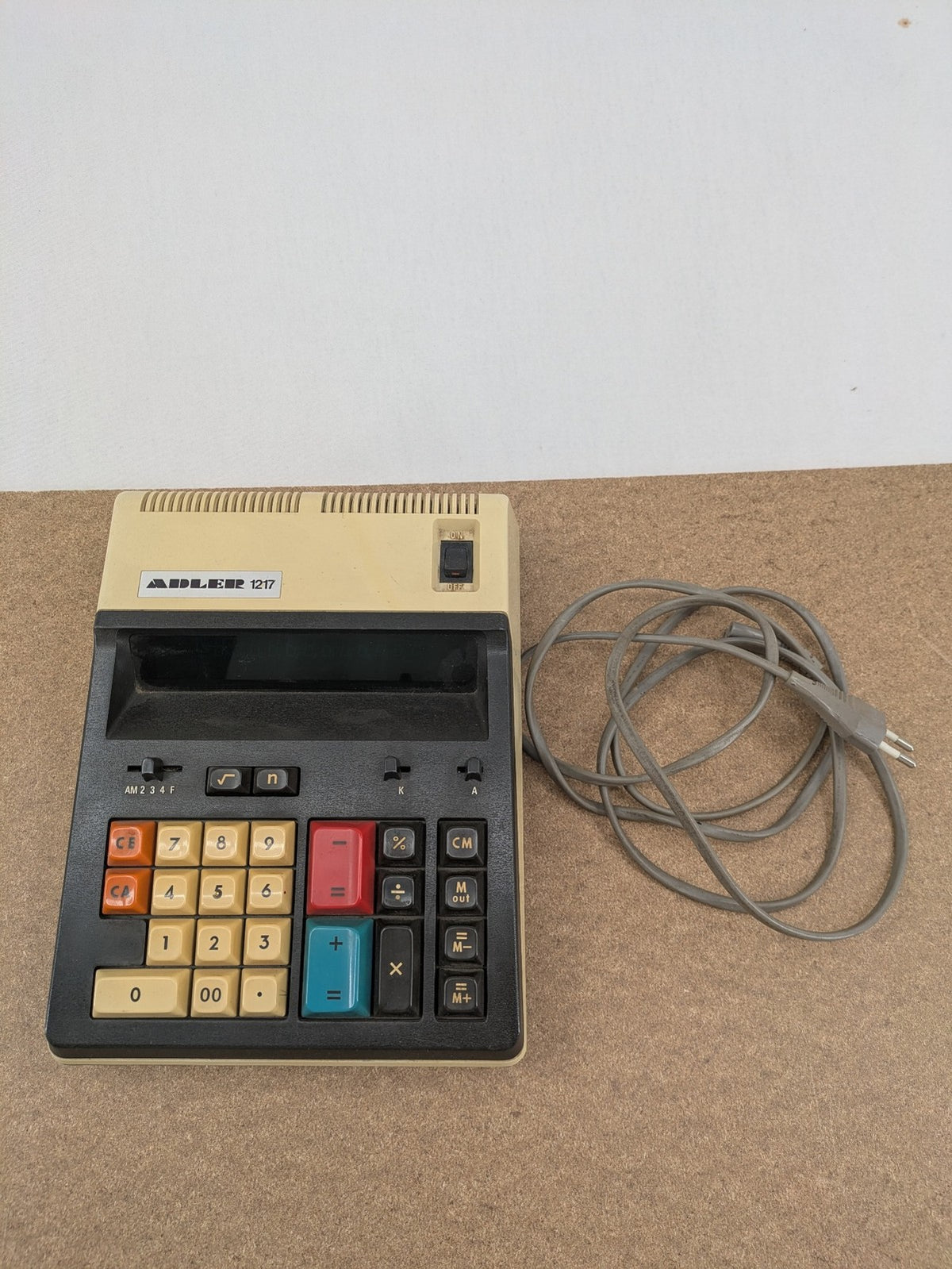 Adler basic calculator beige with colorful keys and retro design, model EC-52.