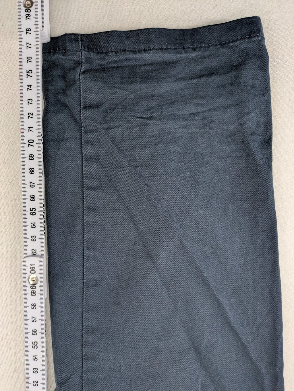 smog blue chino pants with belt loops, button fly, and side pockets