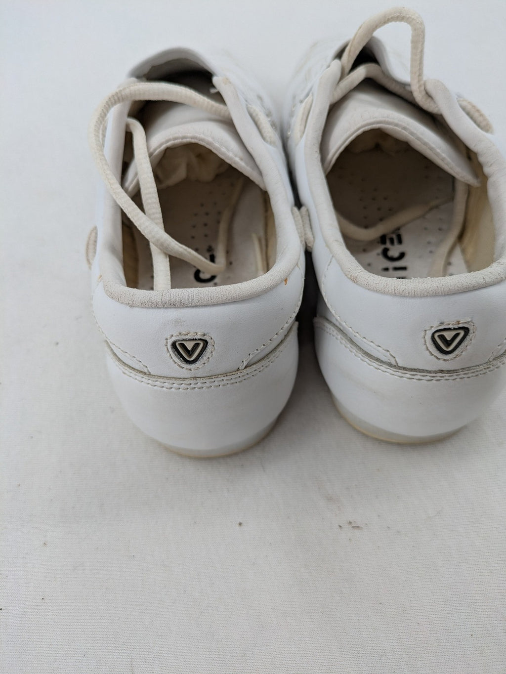 Venice low-top sneakers beige and white with rhinestone embellishments and unique sole pattern.