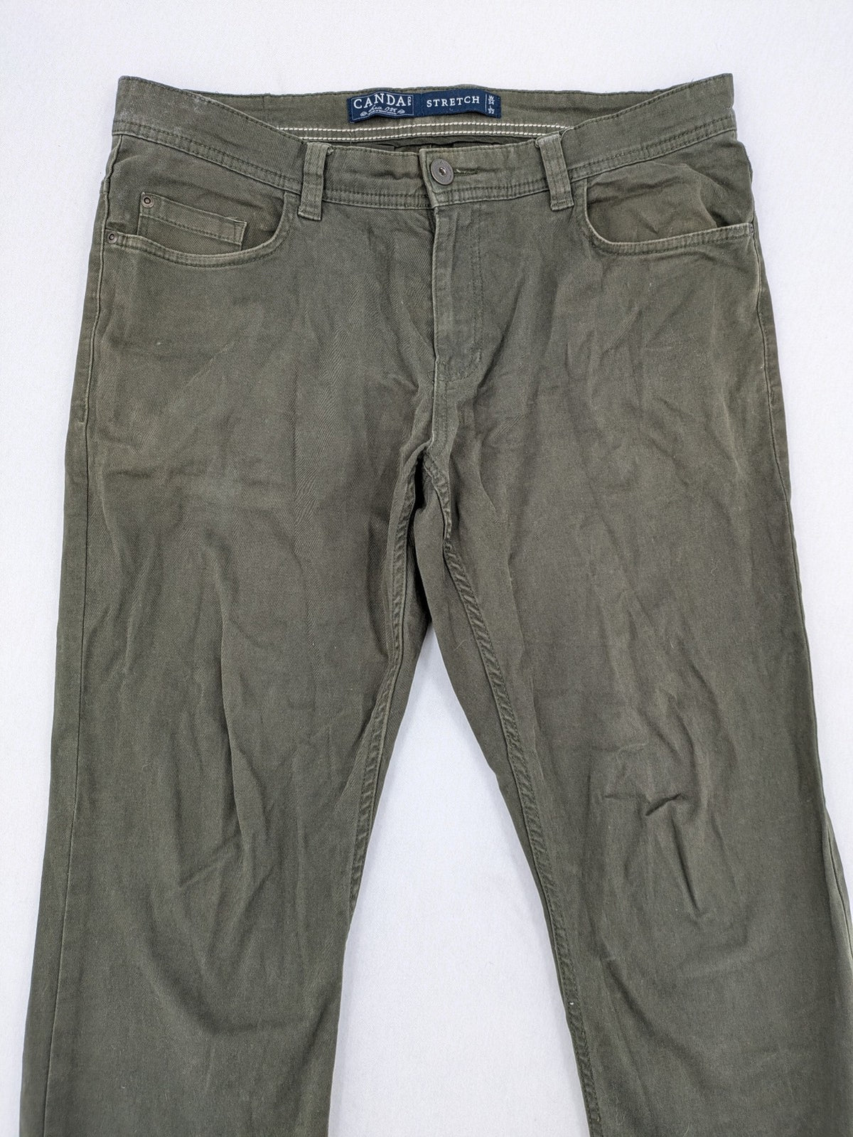 Canda khaki straight jeans 5-pocket design with stretch cotton material.