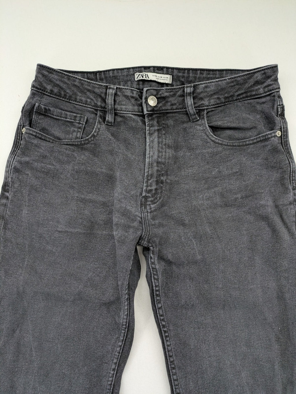 Zara black straight jeans faded wash five-pocket design with zipper closure.