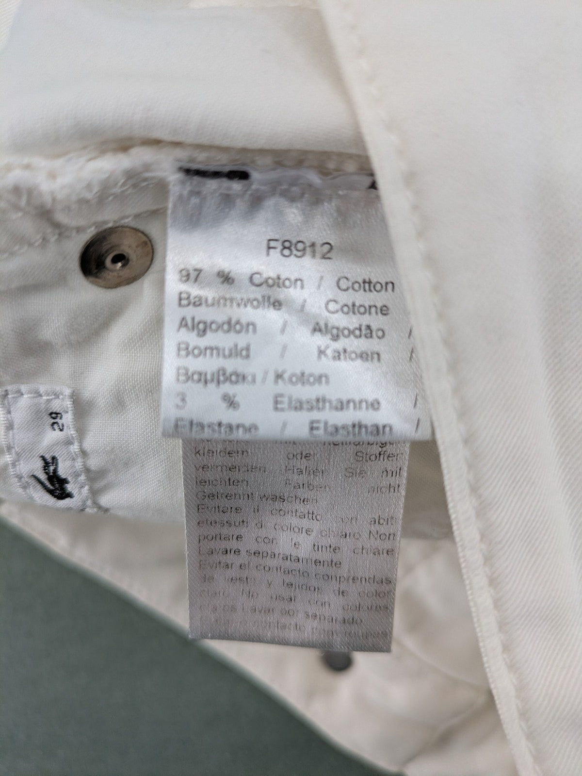 Lacoste white straight jeans high rise slim fit with logo and stretch denim material.