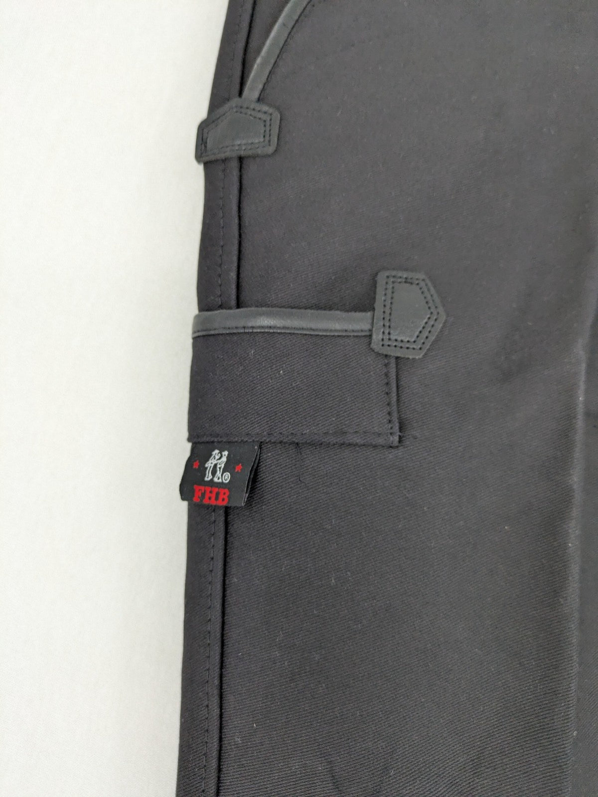 FHB hunting pants grey with double zipper and leather reinforcements, made from 100% cotton.