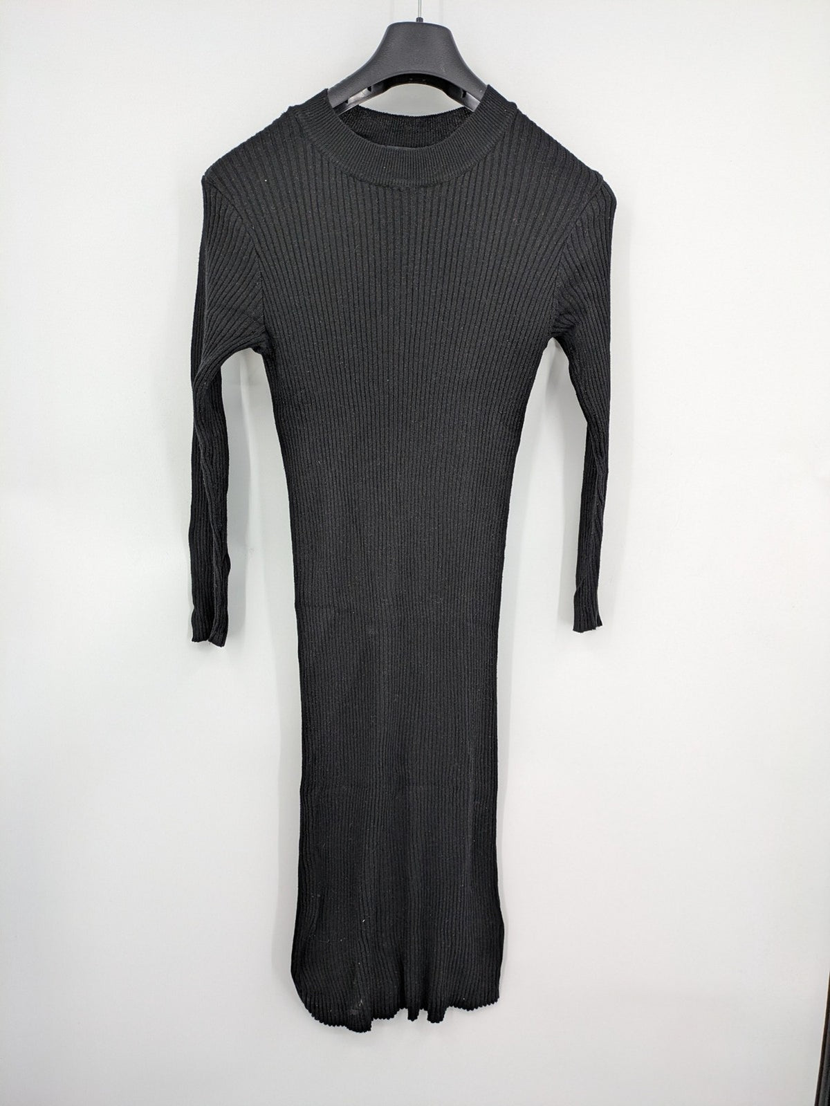 Atmosphere black bodycon midi dress with ribbed texture and long sleeves.
