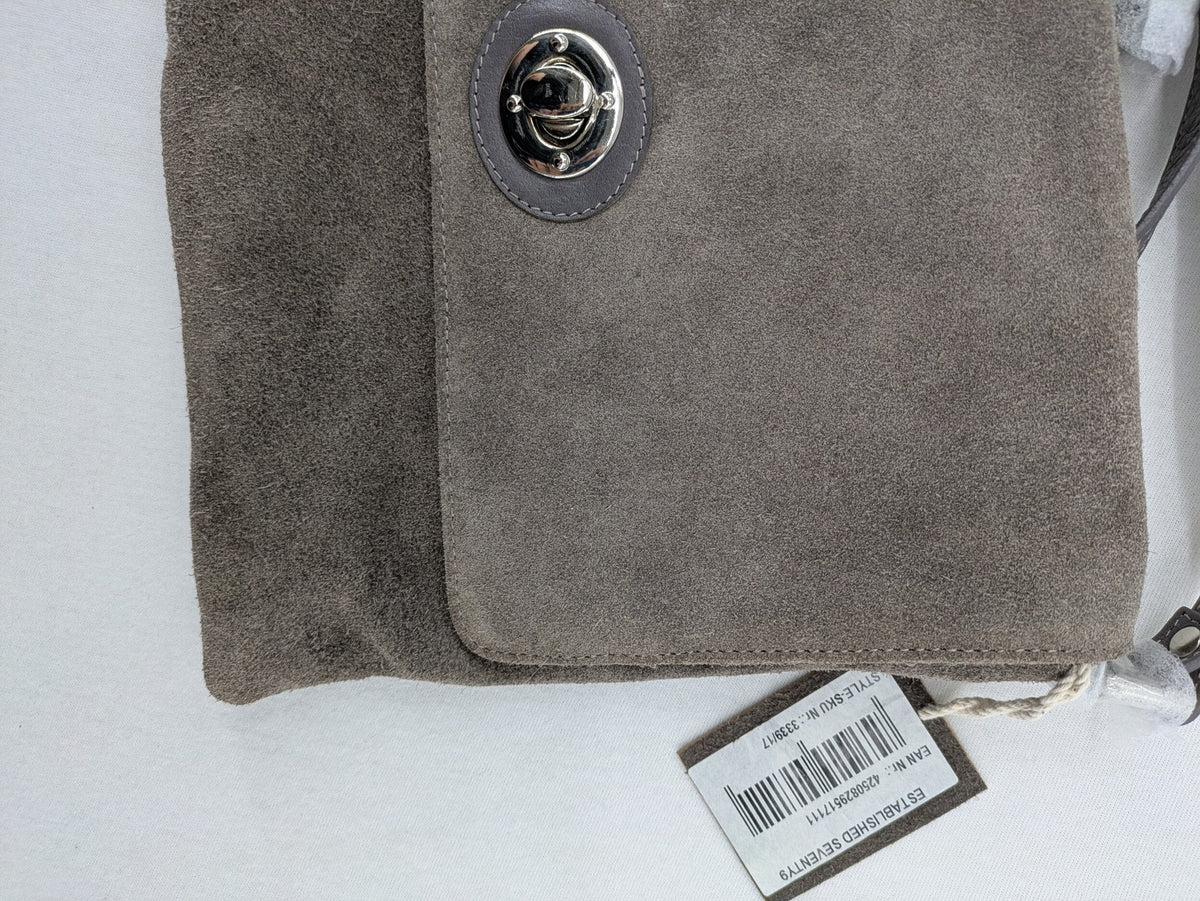 CNTMP grey suede crossbody handbag with flap and silver twist lock closure.