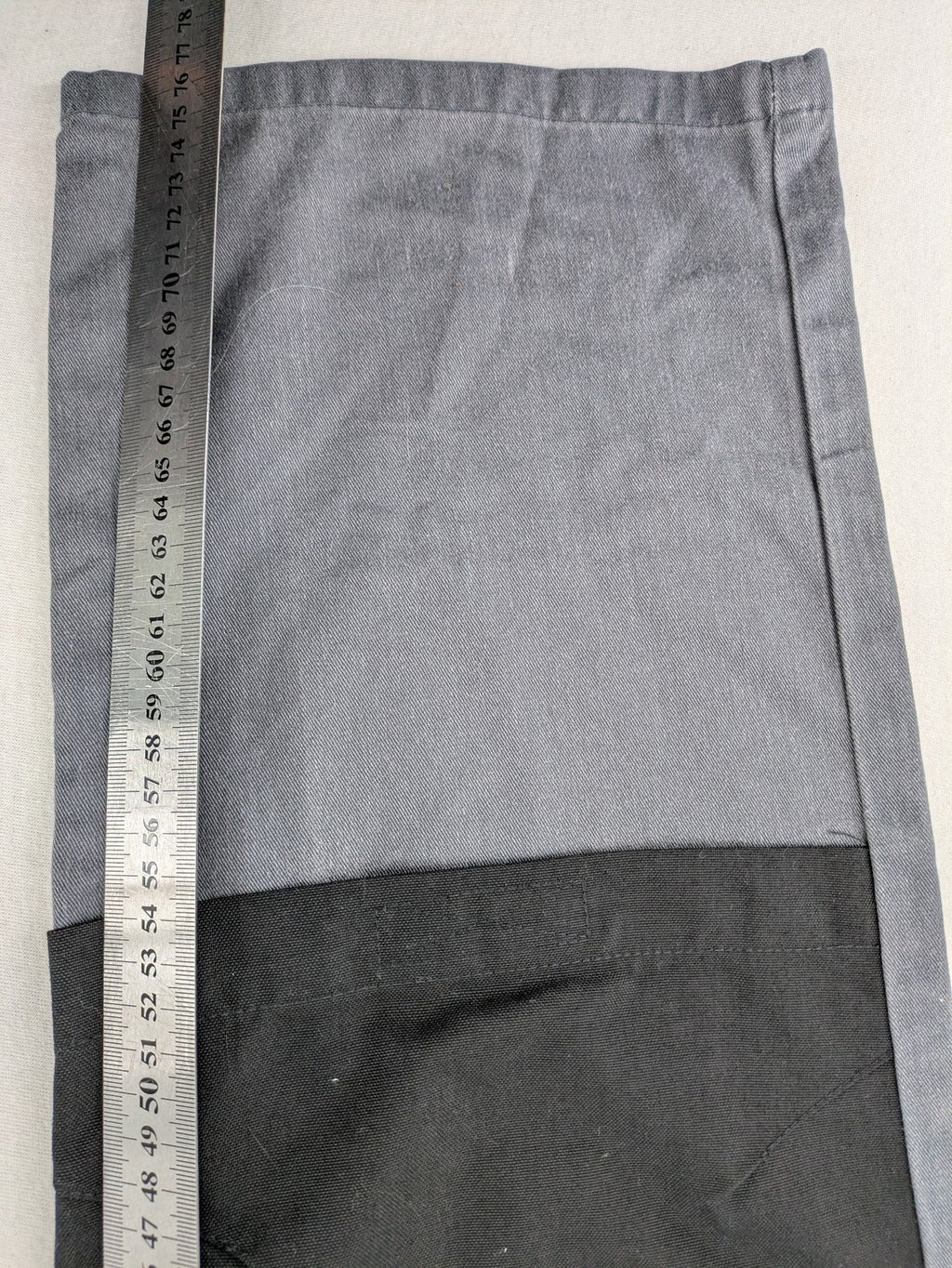 Watsons grey and black hunting tactical pants with Cordura reinforcements and elastic waistband.