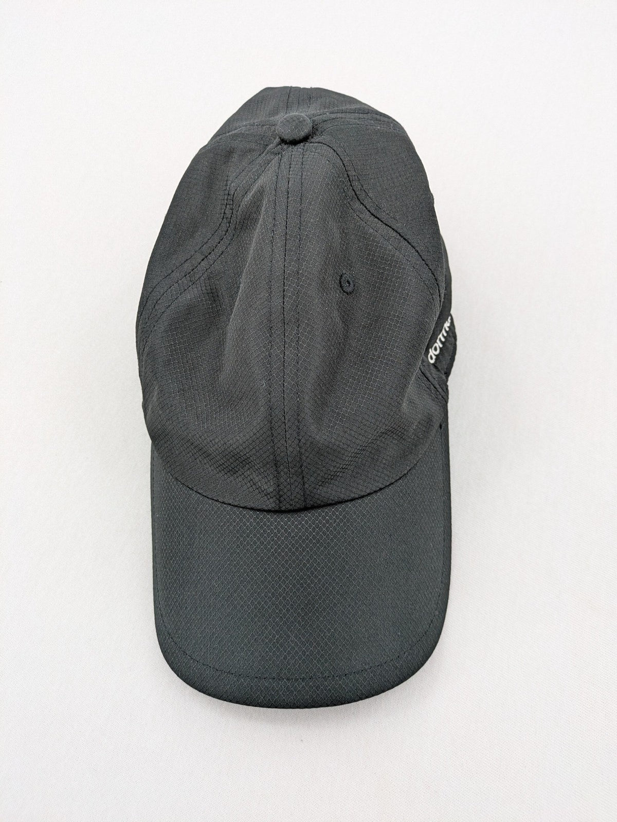 Dormakaba grey baseball cap 6-panel design with white embroidered logo and adjustable strapback.