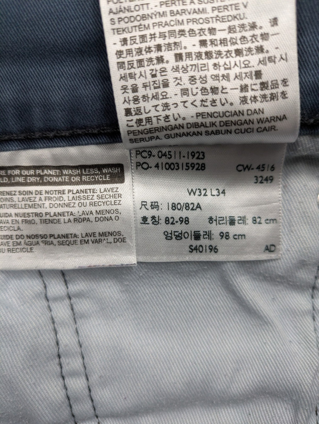 Levi's blue slim fit jeans with faded wash and classic 5-pocket design.