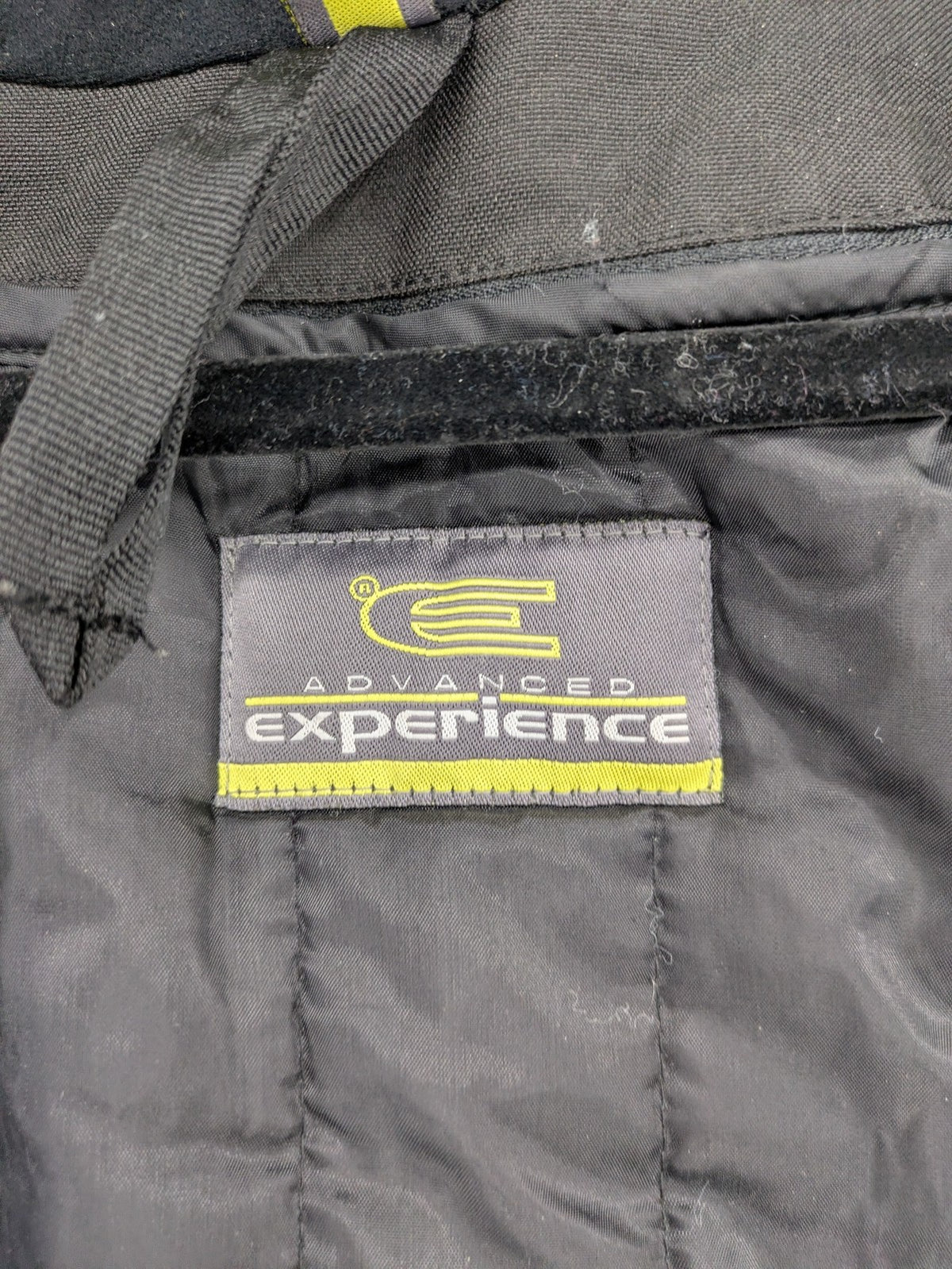 Advanced Experience black motorcycle jacket with Z-Liner membrane and CE protectors, durable Cordura material.