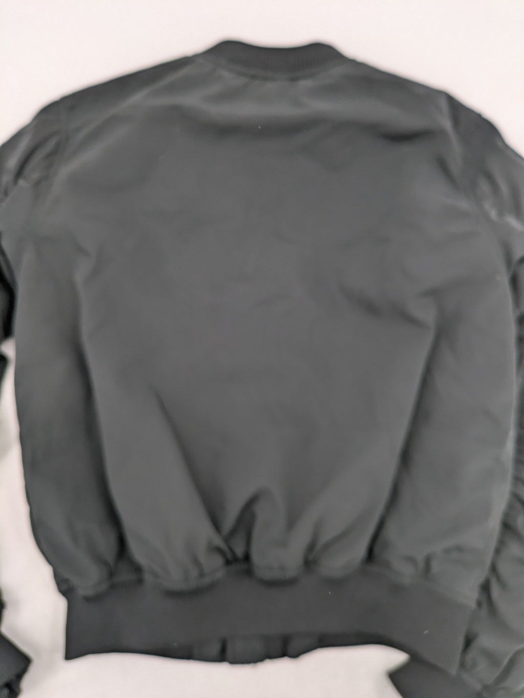 FB Sister grey bomber jacket with full zip, ribbed cuffs, and smooth polyester material.