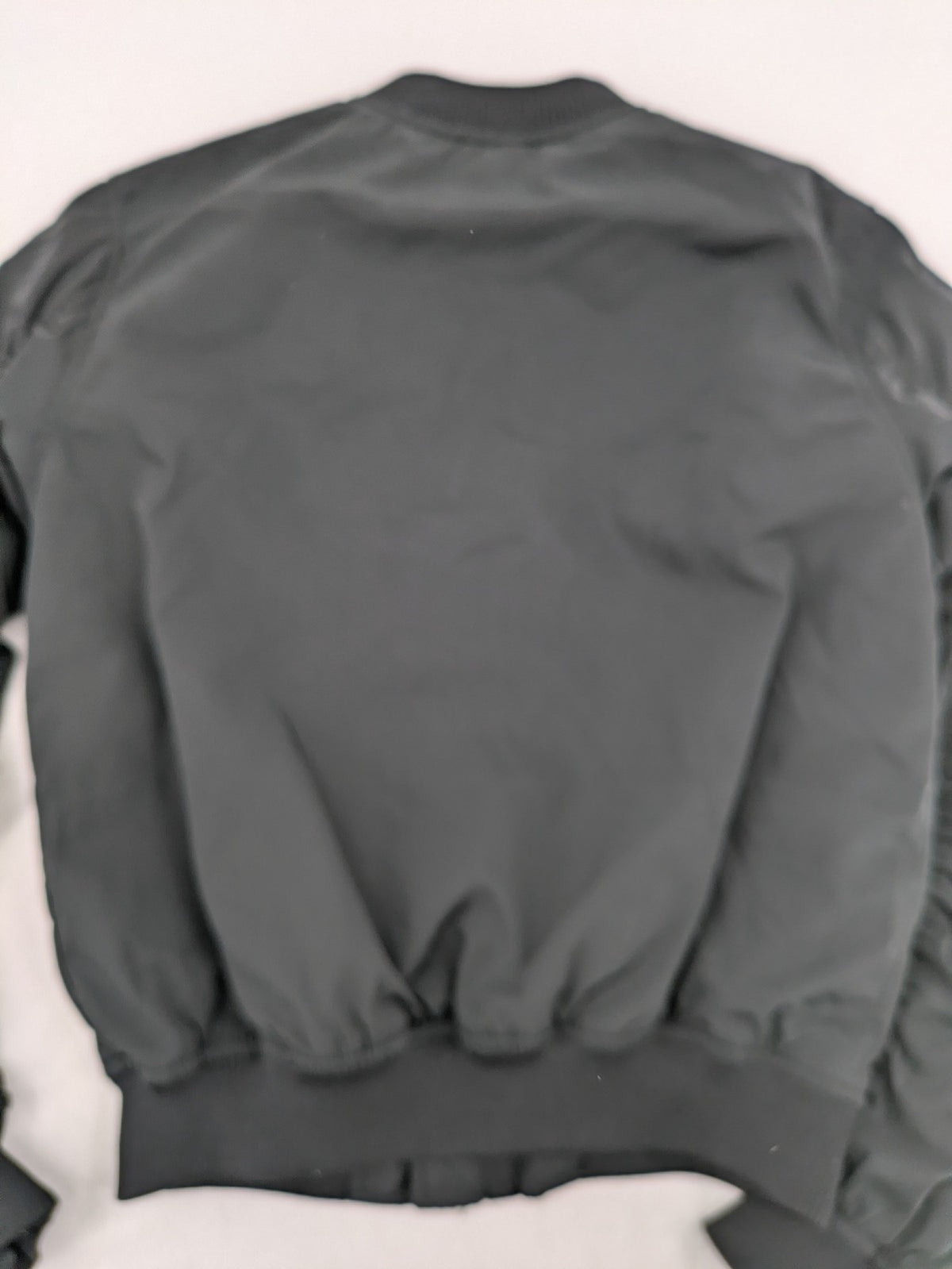 FB Sister grey bomber jacket with full zip, ribbed cuffs, and smooth polyester material.