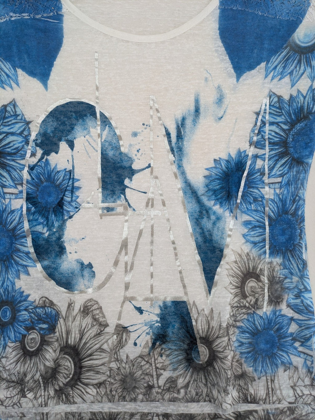 Liberty blue floral print top with metallic "LOVE" lettering, lightweight polyester material.