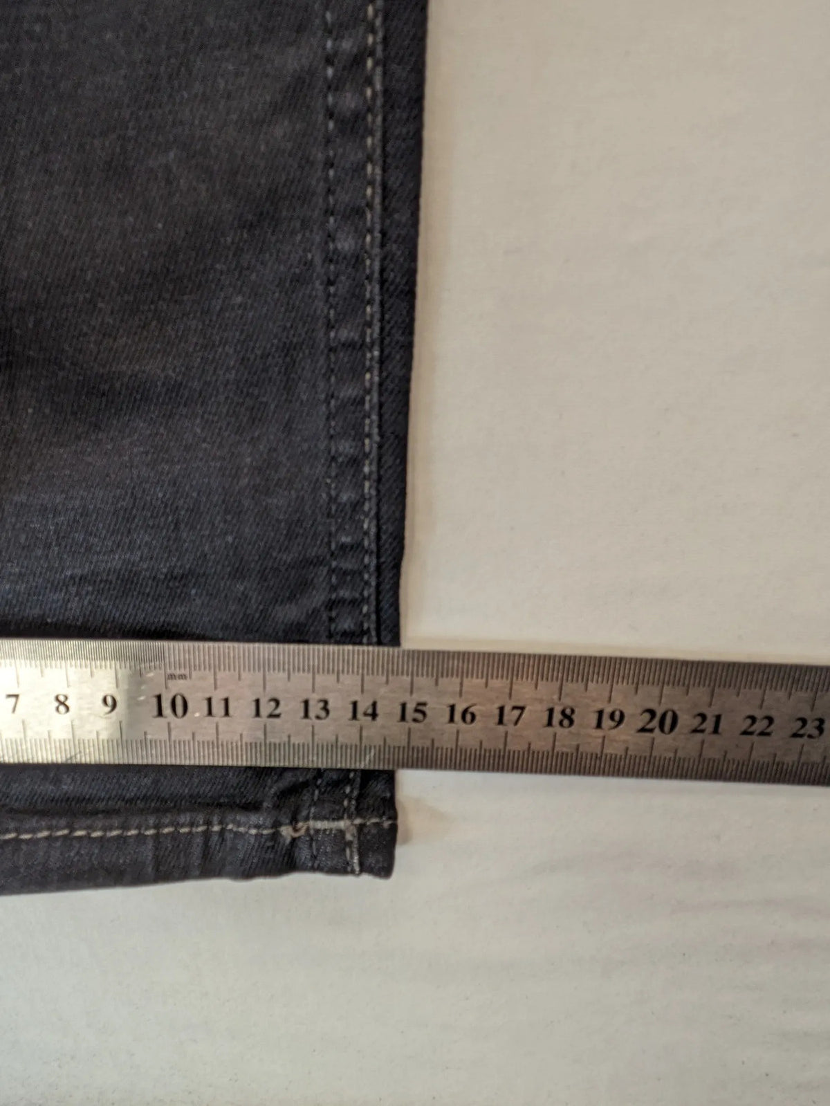 Jack & Jones grey slim fit jeans with classic 5-pocket style and button closure.