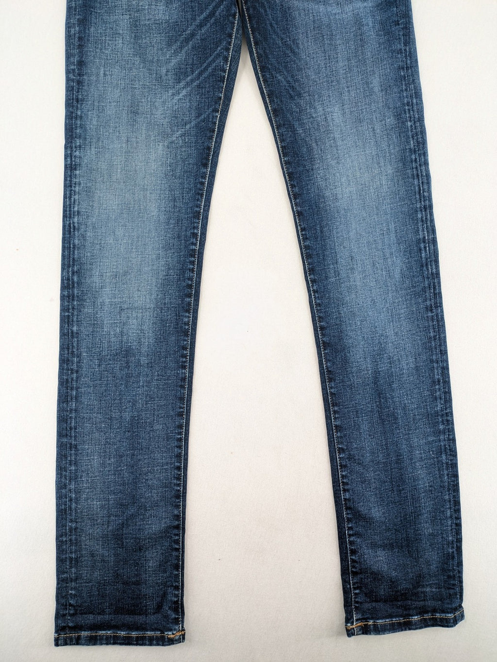 Jack & Jones blue slim fit jeans with faded wash and classic button fly.