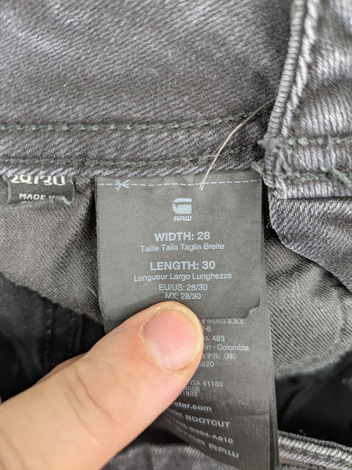 G-Star Raw grey straight jeans with 5-pocket design and logo detailing.
