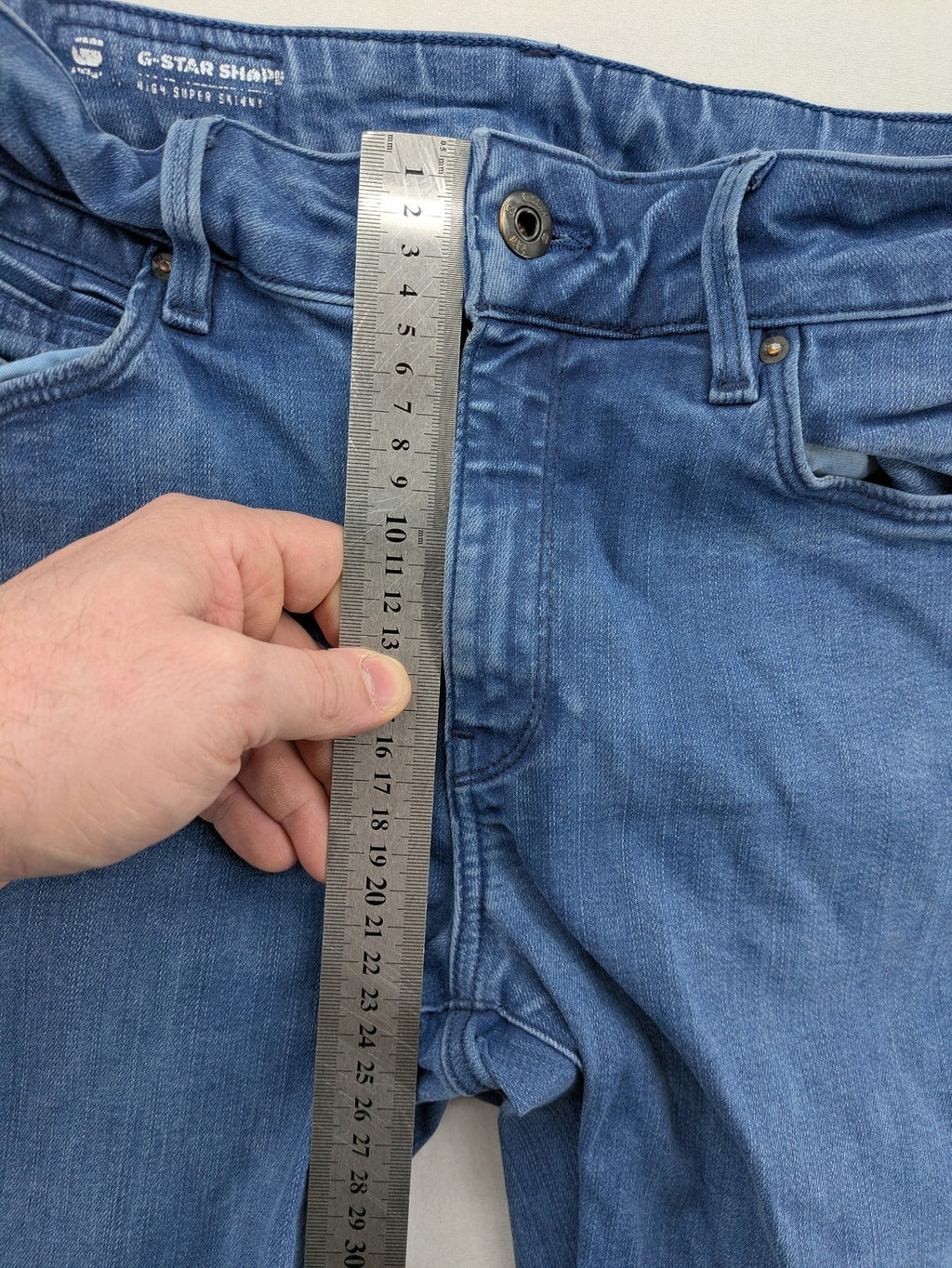G-Star Raw blue high super skinny jeans with medium wash and logo details.