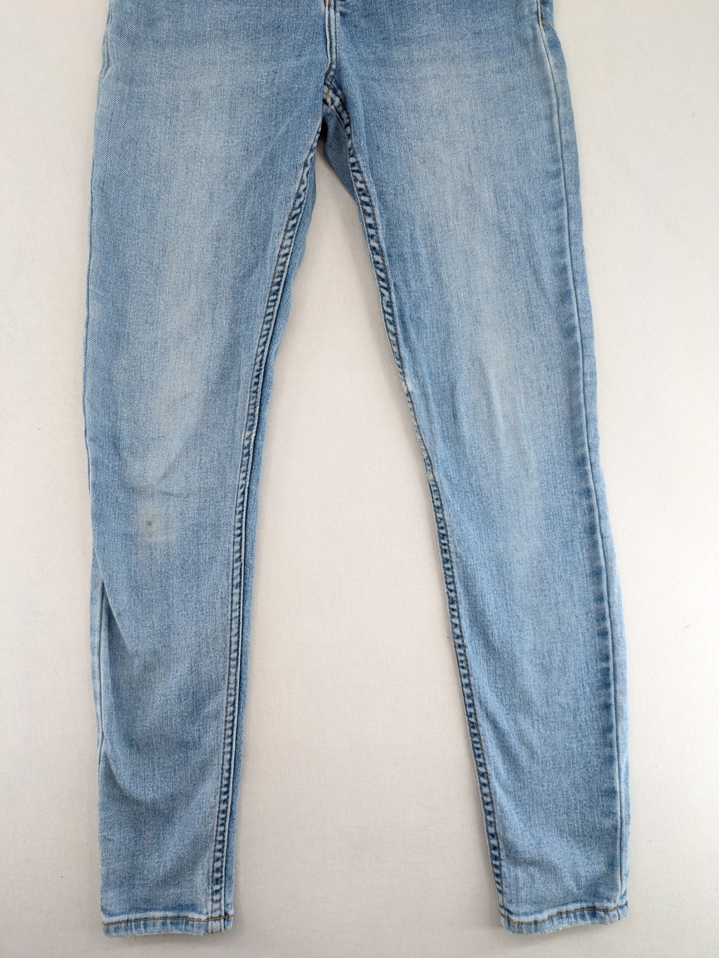 Bershka blue super high waist skinny jeans with washed denim finish and zip closure.