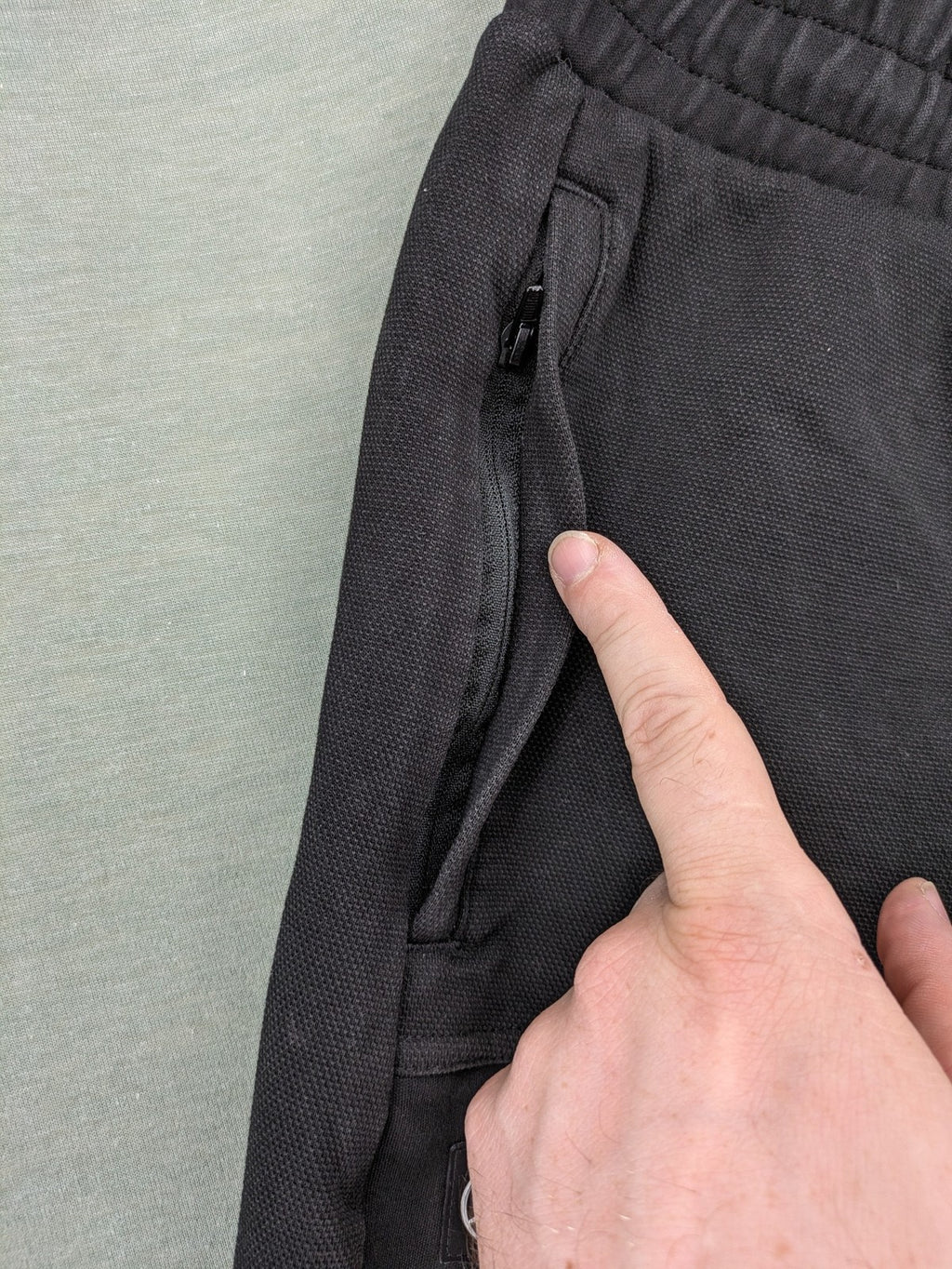 Puma grey sweatshorts featuring Mercedes AMG Petronas logo and elastic waistband.