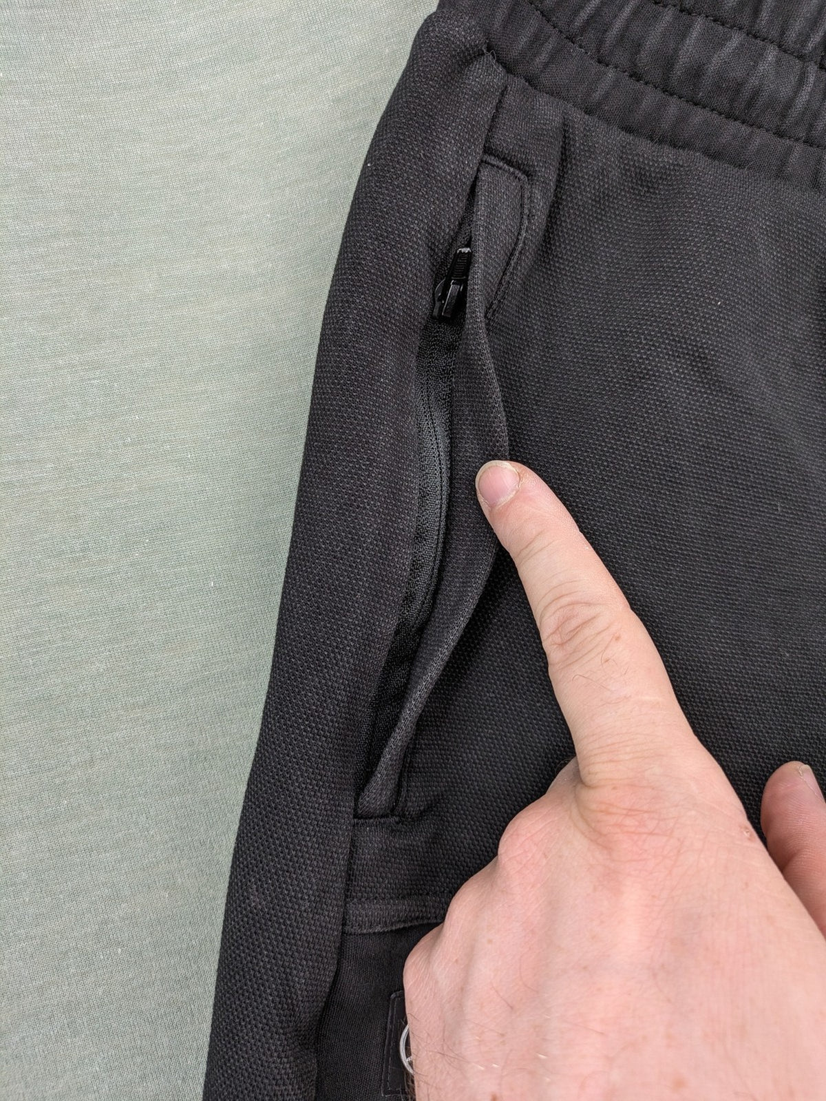 Puma grey sweatshorts featuring Mercedes AMG Petronas logo and elastic waistband.