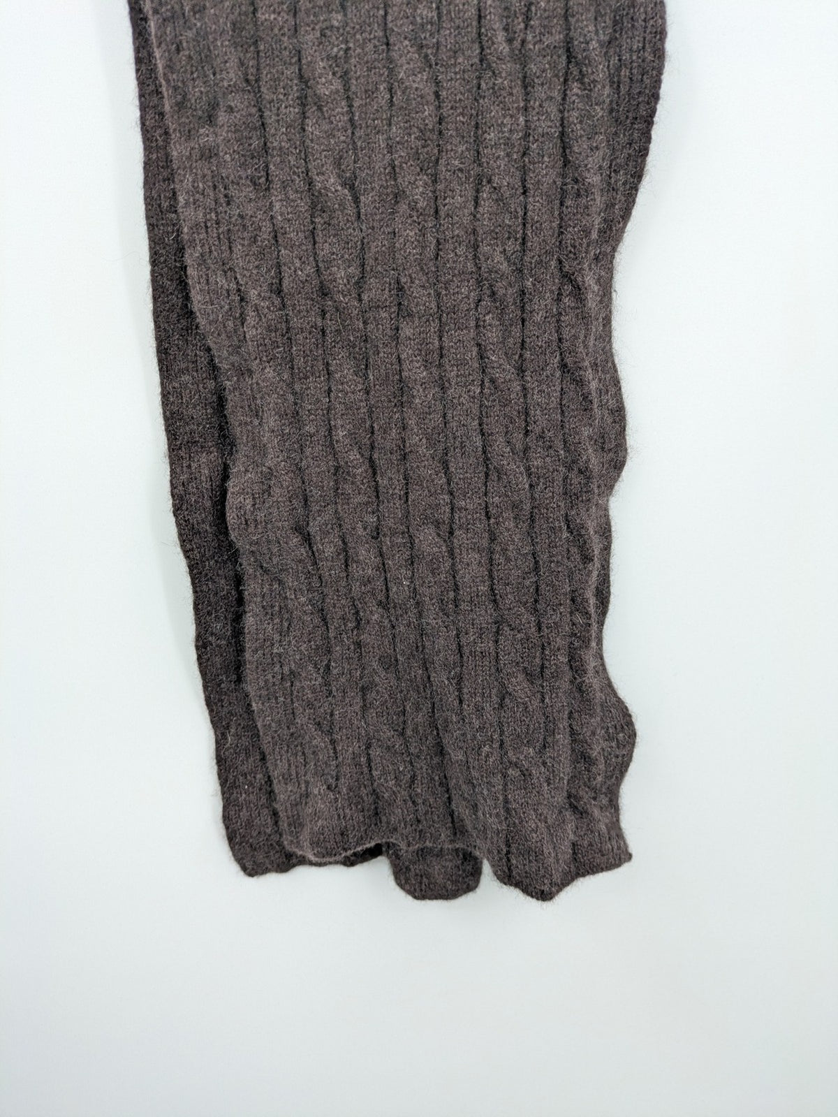 Marlon brown cashmere scarf with classic cable knit pattern for winter warmth.