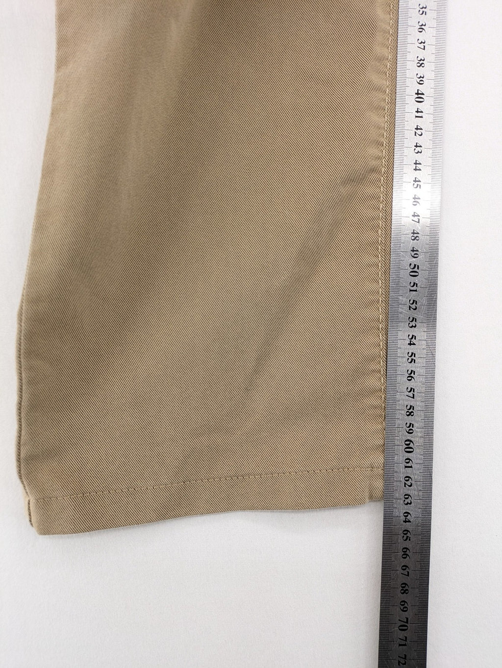 Joker beige straight jeans with double saddle stitching and classic 5-pocket design.