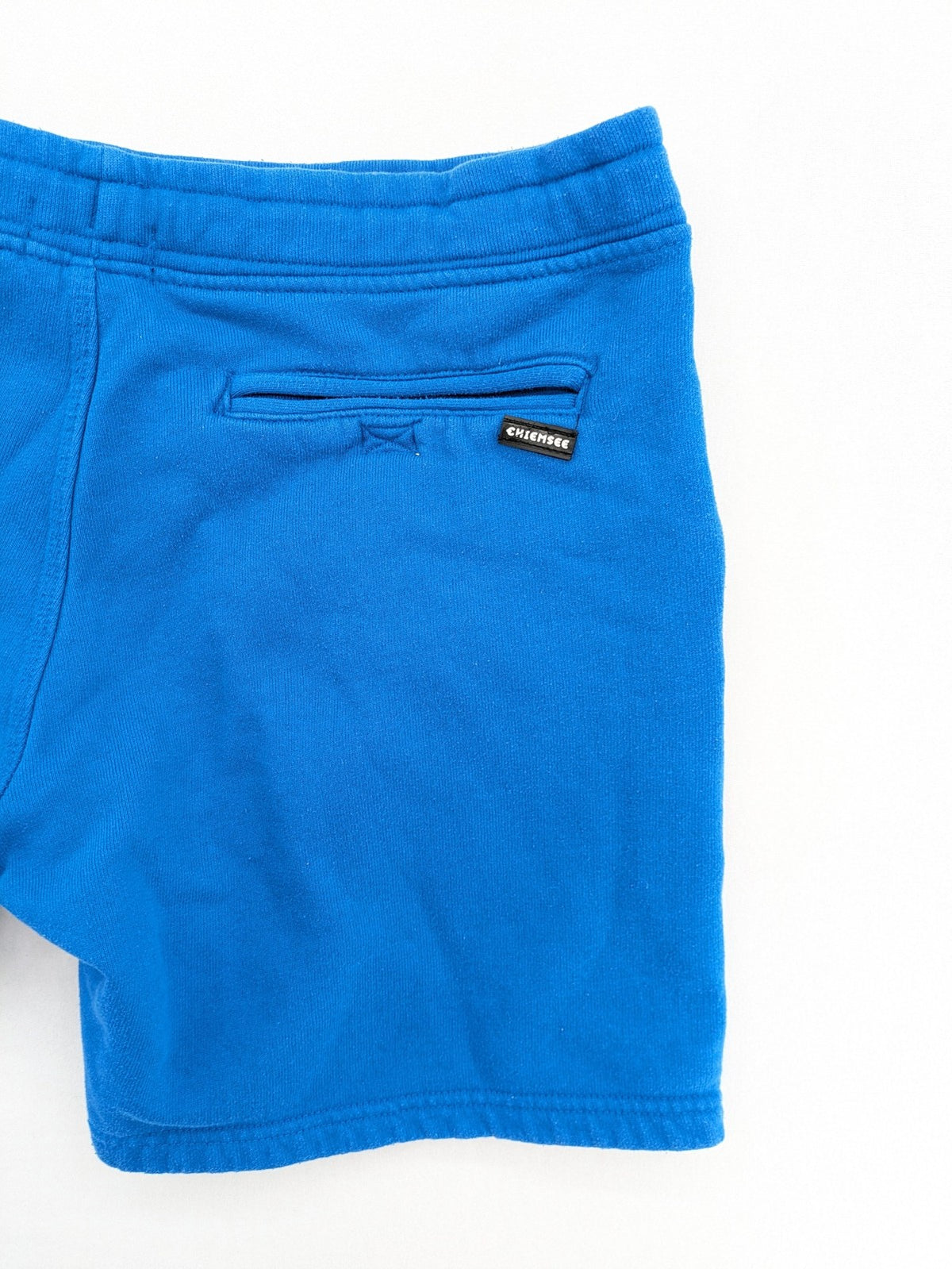 Chiemsee blue sweatshorts with logo print, elastic waistband, and side pockets.
