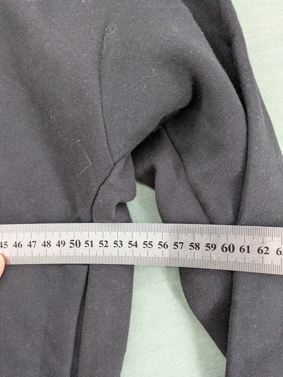 Puma grey zip-through hoodie with iconic logo and two practical pockets.