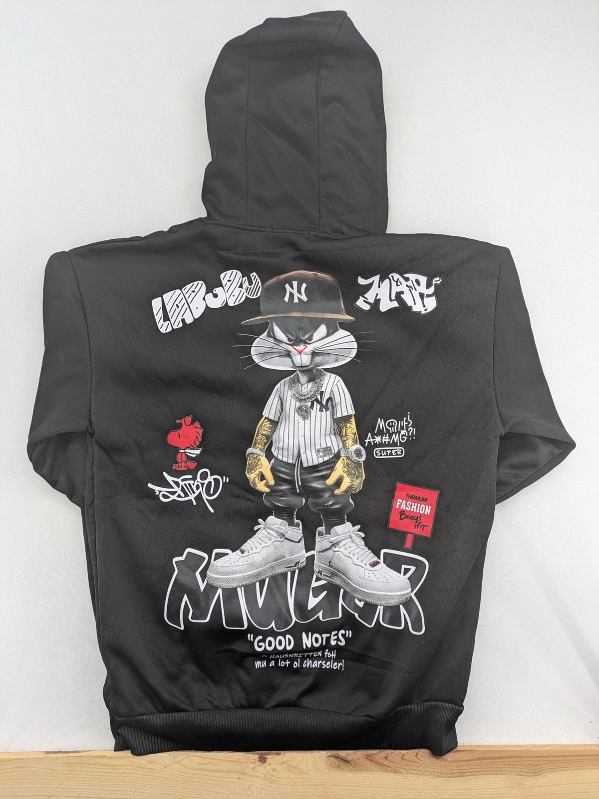 Kuima multi graphic hoodie black featuring large Bugs Bunny print and kangaroo pocket.