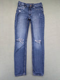 H&M blue skinny jeans with distressed knee details and classic 5-pocket design.
