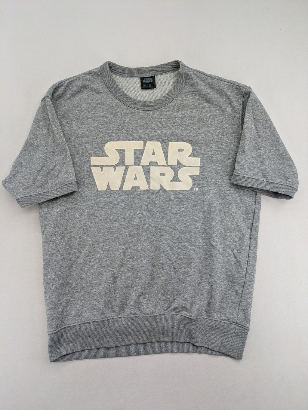 Star Wars grey short-sleeve sweatshirt with large cream logo print on chest.