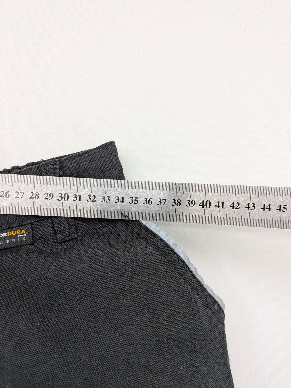 Planam work trousers black canvas with Cordura knee reinforcement and cargo pockets.