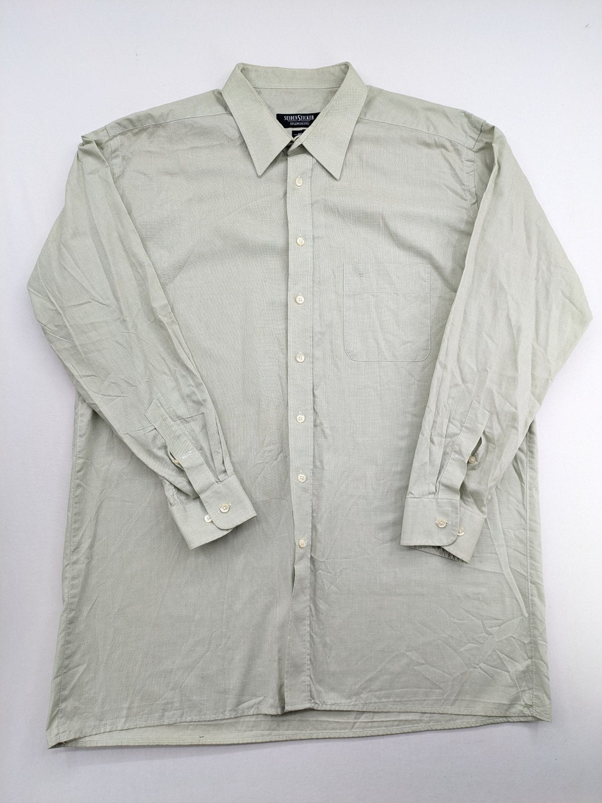 Seidensticker grey button-up shirt with subtle pattern and embroidered logo on pocket.