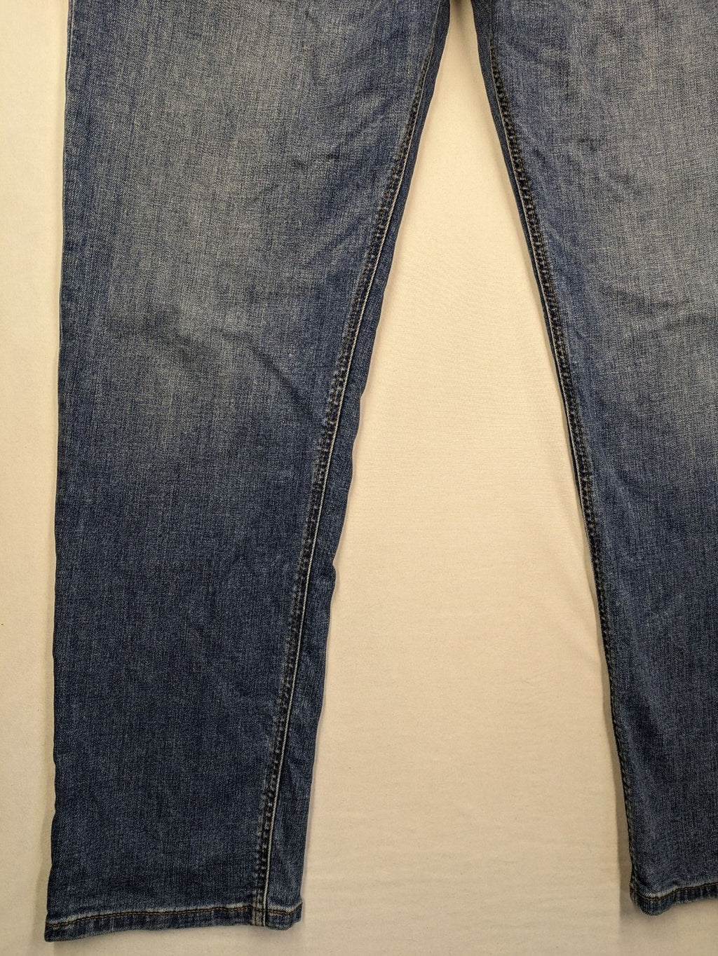 Montego blue straight jeans with stretch denim, classic design, and regular fit.