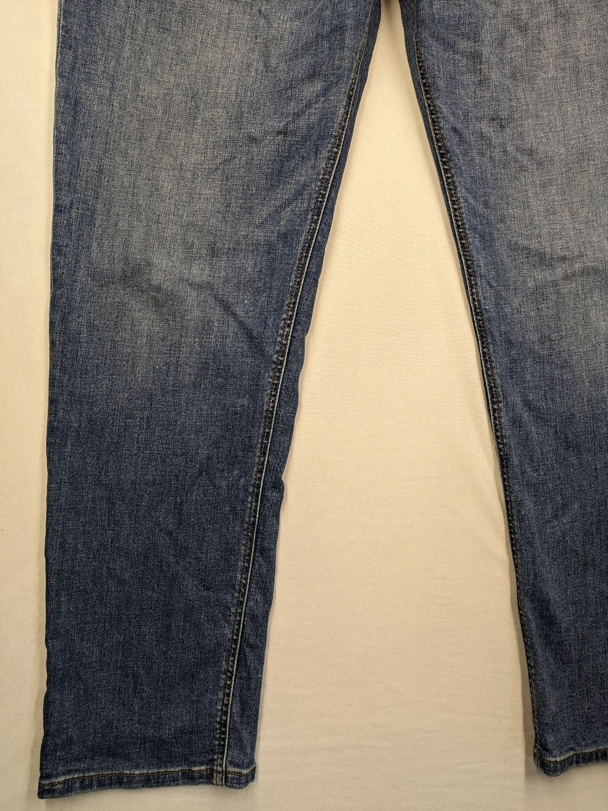 Montego blue straight jeans with stretch denim, classic design, and regular fit.