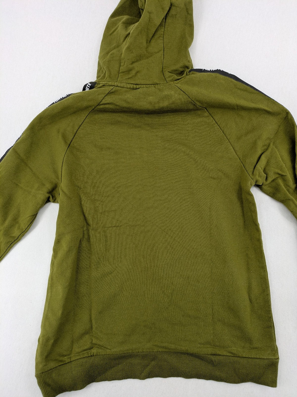 Fortnite green camo hoodie with black logo, contrasting hood, and logo taping on sleeves.
