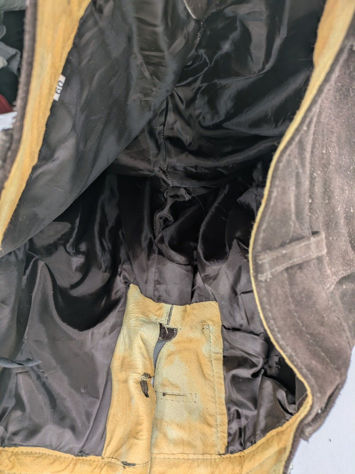Braun traditional leather pants brown suede with intricate embroidery on bib and legs.