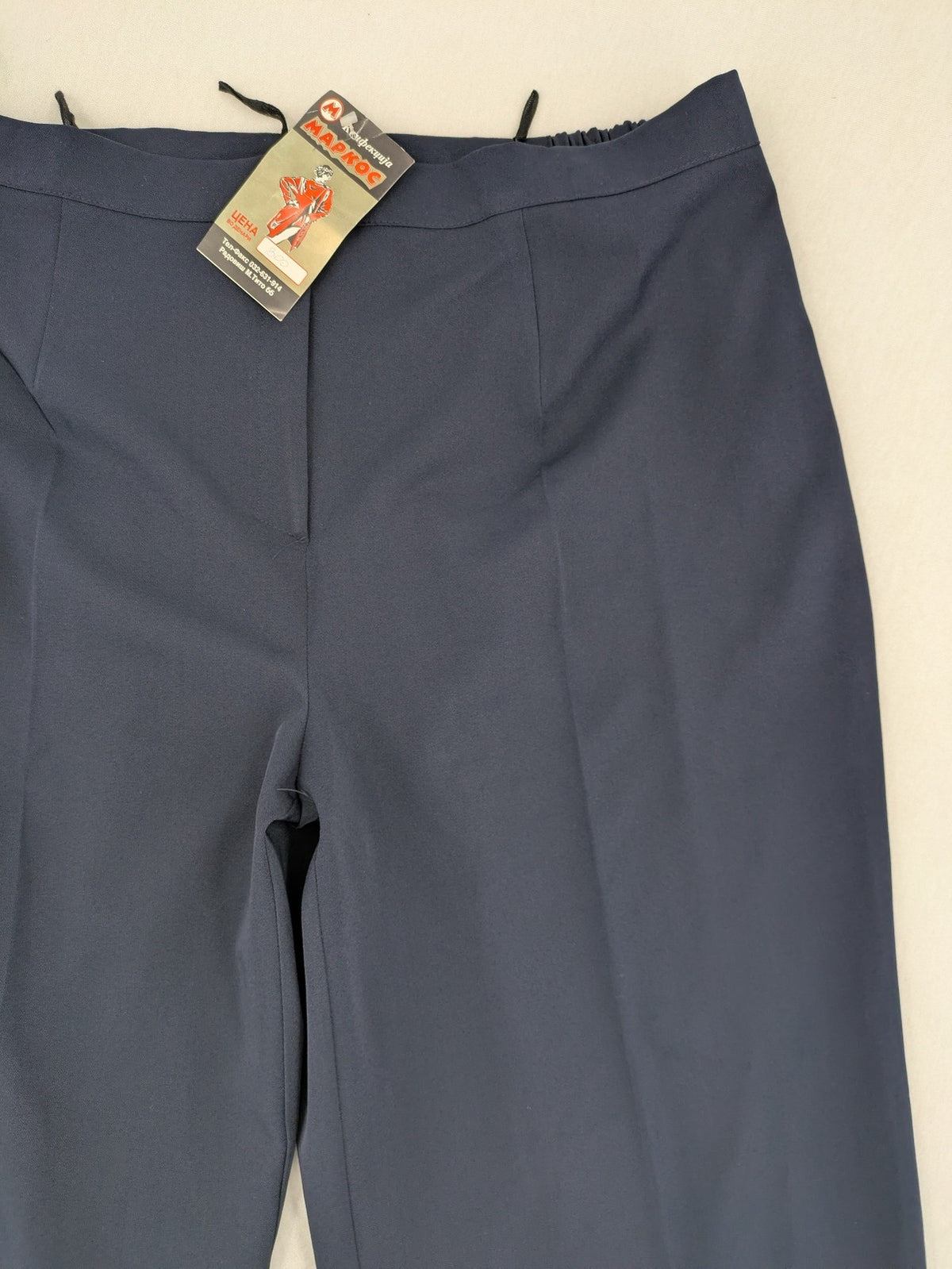 Baumwolle navy motorcycle pants with elastic waistband and classic straight cut design.