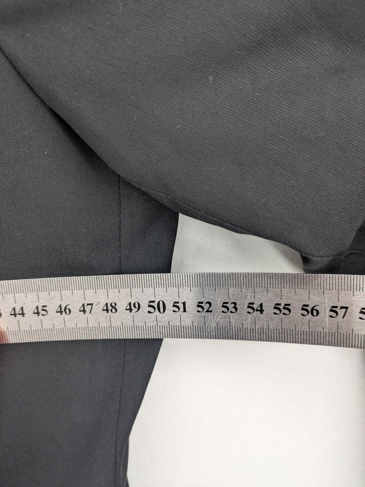 Zara Man grey blazer two-button design with structured silhouette and smooth lining.