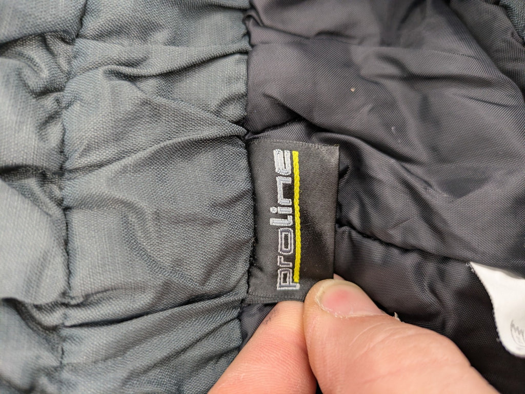 PROLINE grey winter ski pants with adjustable straps and insulated durable material.