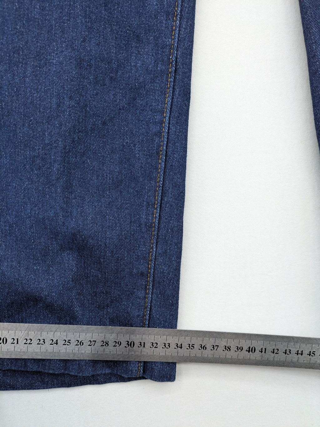 Emery Rose pink culotte pants with wide legs, double button closure, and soft denim blend.
