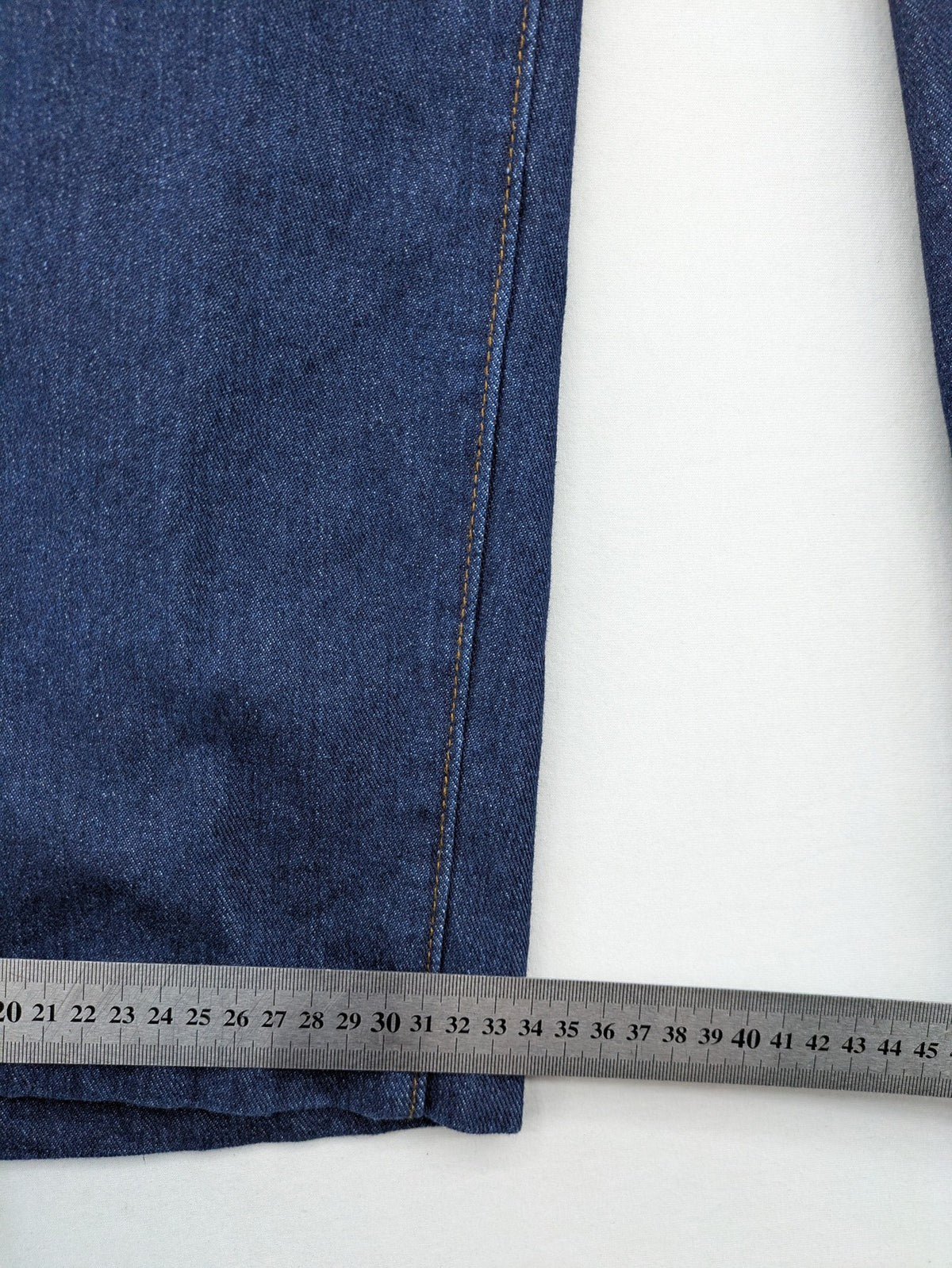 Emery Rose pink culotte pants with wide legs, double button closure, and soft denim blend.
